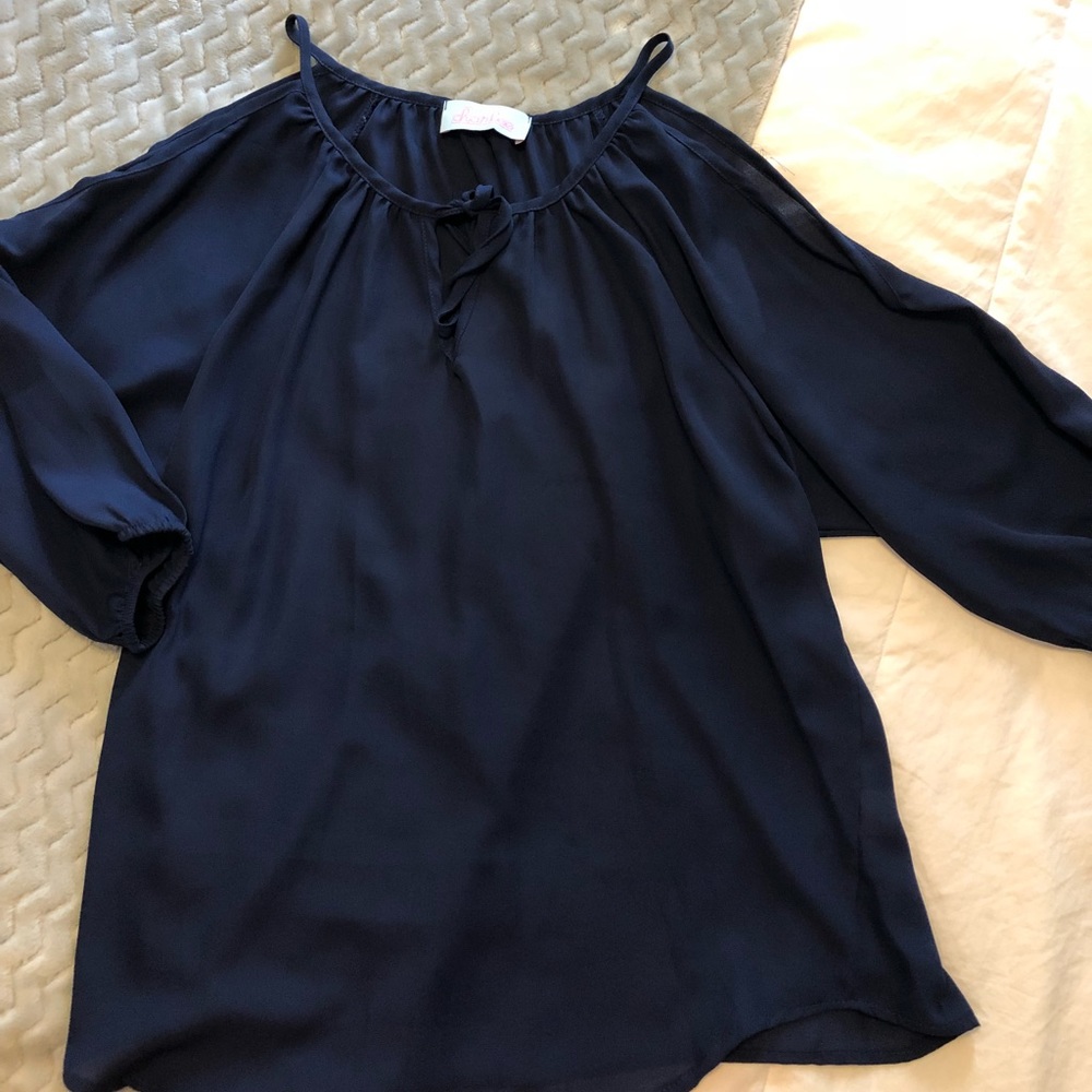 Dark blue dress shirt.